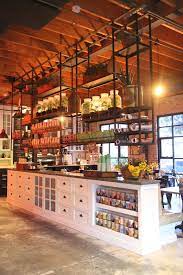 Is the passport office part of the home office? The Grounds Of Alexandria Sydney Petite Passport Restaurant Interior Cafe Interior Metal Room Divider