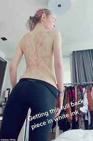 Grimes might not be of this planet. Elon Musk S Girlfriend Grimes Shares Video Of Her Latest Inking Of Beautiful Alien Scars Newswep