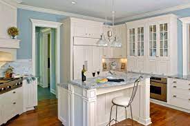 Blue and white kitchens featuring ideas in a variety of design styles. Multi Level White Cabinet Breakfast Island With Ice Blue Countertops Traditional Kitchen Chicago By Orren Pickell Building Group Houzz