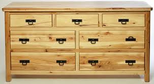 The five drawer dresser has 5 wide drawers and wood knobs. 48w X 30h X 20d Houston 5 Drawer Cherry Dresser