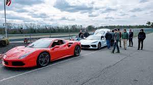 $75k corvette c8 vs $157k ferrari 458? C8 Corvette Attracts Crowd While Ferrari 488 Looks Rather Lonely