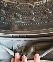 Rotten egg smell when clothes washer drains. How To Clean Your Front Load Washing Machine House Becomes Home Interiors