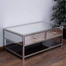 Use this guide to learn how to make a coffee table with an optional shelf for remote controls. Ryanne Studded Mirrored 2 Drawer Coffee Table Mirrored Coffee Tables Coffee Table Coffee Table With Storage
