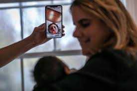 Connecticut teacher takes in student's newborn brother while family  recovers from COVID-19