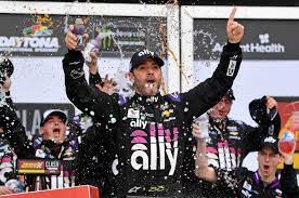 Jimmie johnson chats with joe gibbs racing mechanic sean kerlin on the champion's ride for bicycle safety. Daytona Clash Jimmie Johnson Triggers Wreck Wins Nascar Exhibition
