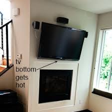 The glenn floating fireplace mantel bracket adds open shelving with a rustic touch to any space. How To Prevent Wall Mounted Tv Above Fireplace From Getting Hot Home Improvement Stack Exchange
