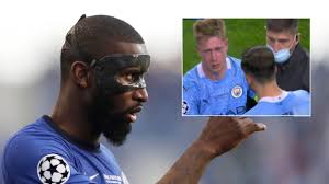 Already wearing his own mask after colliding with luka modric in leg 1 of the ucl semis, antonio rudiger collided with kevin de bruyne in the ucl final, forcing the belgian out of the game with 30. Chelsea Defender Rudiger Accused Of Dirty Tactics In Brutal Collision Which Forces De Bruyne Out Of Ucl Final In Tears Rt Sport News