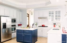 White backsplash with gray kitchen cabinets. Grey Cabinets And Navy Island Kitchen Update Before After Laura Fuentes