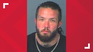 Spring Hill man accused of trying to steal car with man inside it