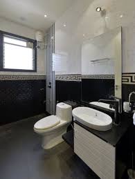 Hexagonal tile on the floor and bath, brick tile around the bath, and blue patterned mosaic around the sink could be overwhelming, but it isn't. Simple Small Indian Bathroom Ideas Novocom Top