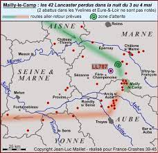 Footage shows the clifftop crash site with charred foliage and a sheer drop to the ground below. Recherche De France Crashes 39 45
