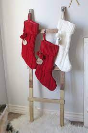 How To Make A Diy Ladder Stocking Holder The Home Depot Hanging Christmas Stockings Christmas Stocking Holders Christmas Stocking Holder Stand