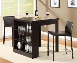 This one is pretty much like #1 except it is countertop height giving more room for tall storage like wrapping paper. Dining Tables For Small Spaces Small Dining Table With Storage Shelf Home And Interior De Small Dining Room Table Dining Table With Storage Dining Room Small