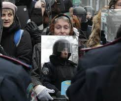 Ukraine is the world's sixth heaviest drinking country. People With Mirrors In Some Protests In Ukraine Credit Sergei Chuzavkok Pics