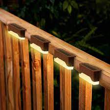 The low voltage led under rail strip light is the perfect way to add accent lighting to any deck railing. Solar Deck Lights Outdoor 4 Pack Waterproof Led Solar Fence Lights For Railing Stairs Patio Step Walkways Auto On Off Warm Light Amazon Com