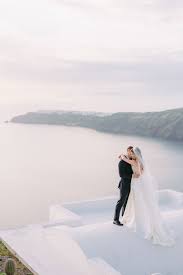 When you're planning your elopement, it can be super easy to want to pick a date first, but if you have the flexibility, you're more likely to have exactly what you want for your elopement day if you plan the date around all the things mentioned above like the specific location, weather, and what you want to do. Elope In Greece A Dreamy Destination Elopement In Santorini