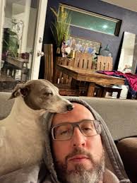 Dante can't make up his mind...the great debate; to sleep or to play!