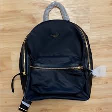 The tory burch® perry nylon flap backpack embraces style and functionality with a nylon finish, leather trim, and quilted interior. Tory Burch Bags Tory Burch Perry Nylon Zip Backpack Poshmark