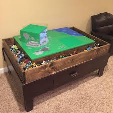 Coffee table with train table/storage in this plan you'll see how to build a coffee table with a simple, modern base and train table on top, which can also be used as storage. Train Table To Lego Table Promotions
