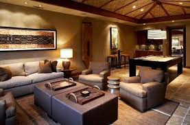 Apr 25, 2018 · in the living room of a retreat on martha's vineyard, designed by ashe + leandro, the sofa by restoration hardware is covered in a perennials linen, the hans wegner chairs are upholstered in a brochier fabric, and the walnut cocktail table and stool are custom; 17 Awesome African Living Room Decor Home Design Lover