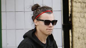 A bun is a type of hairstyle in which the hair is pulled back from the face, twisted or plaited, and wrapped in a circular coil around itself, typically on top or back of the head or just above the neck. Groupon Clip In Man Bun Teen Vogue
