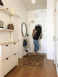 The chic white painted base under the unfinished rustic wood top, create a handsome rustic yet modern appeal of this bench. The Best Thing To Happen To Our Tiny Entry 600sqftandababy Nyc Apartment Decorating Small Entryways Small Apartment Decorating