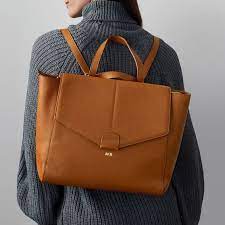 The daily convertible backpack is crafted from beautifully soft leather with a pebbled texture and lined mark and graham offers colorful and timeless gifts, totes, bags, jewelry, linens, glassware + more. Daily Convertible Monogrammed Backpack Mark And Graham