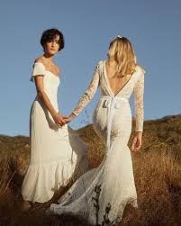 Why These Bridal Salons Are The Best In New York City Lesbian Bride Popular Wedding Dresses Wedding Bridesmaid Dresses