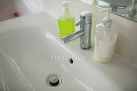 What should i do if my child washes her hands too often? Empty Bathroom With Hand Wash Basin At Home Reflection Clean Stock Photo 225304162