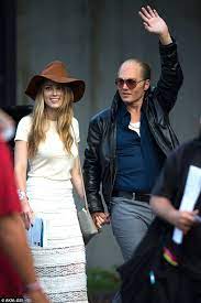 Depp sued the sun's owners and the author of the article, claiming it wrongly portrayed him as being guilty of domestic violence. Johnny Depp And Amber Heard Put Marriage Plans On Hold Daily Mail Online
