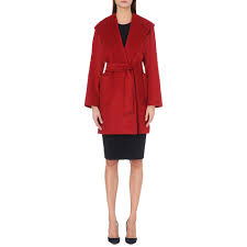 The ultimate camel coat, this gorgeous style has been worn by many celebs. Max Mara Rialto Hooded Camel Hair Coat Evachic