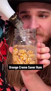 I left Orange Creme Savers in Malibu Rum for a week #rum #cremesavers  #dokaryan #fyp #orangecremesavers