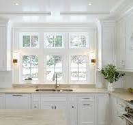 Taj Mahal quartzite Countertops with Glassos Herringbone ...