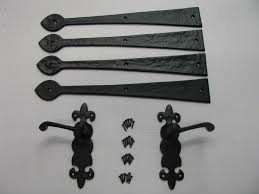 Magnetic handles and four 18 in. Decorative Hardware Carriage House Black Lever Garage Door Garaga