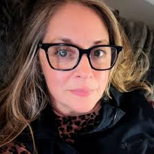 A client at my veterinary clinic who owns a meticulously groomed westie  recommended this grooming tool to me. It has hooks that effectively remove  the undercoat, resulting in a significant amount of