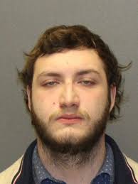 Bank teller accused of assaulting customer in home invasion