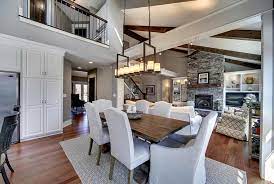 The greige island is paired with a wood countertop, and the whole kitchen has a grey tile floor. Perfect Greige Sw 6073 Review