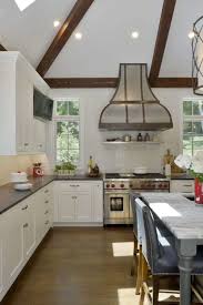 In these kitchens, high kitchen cabinets will on serve to make the interior space look more cramped. The Fifth Wall Incorporating The Ceiling Into Your Kitchen Bath Designs
