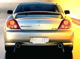 Image result for Triton Green 2004 Tiburon