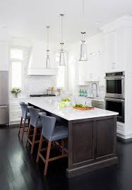 Some of these are dark ebony, others are dark brown. Brown Kitchen Island On Ebony Wood Floors Transitional Kitchen