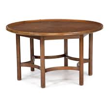 Coffee table w/ raising top/compartment: Watting William A Circular Walnut Coffee Table Mounted On Six Octagonal Legs Top With Slightly Raised Edge Mutualart