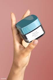 Download Premium Psd Of Hand Holding Face Cream Jar Mockup 2054420 In 2020 Face Cream Beauty Products Mockup Blue Spray Bottle