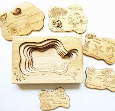 A traditional technique reinvented for the present—and just in time for the holidays. Tidepool Layered Puzzle Ocean Wooden Puzzle Montessori Wooden Puzzle Educational Toys Wooden Puzzles Tide Pools Educational Toys