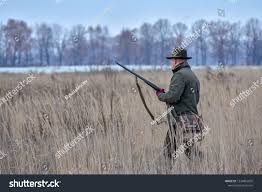 The Bird Hunter Walks Through The Field With His Dog On A Partridge Hunt Ad Sponsored Walks Hunter Bird Field Bird Hunter Hunter Stock Photos