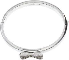 Kate spade new york is part of the tapestry house of brands. Amazon Com Kate Spade New York Ready Set Bow Bangle Hinged Bracelet Clear Silver Clothing