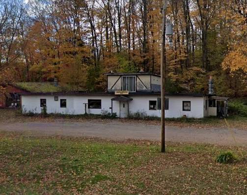 The old Tanglewood Bar, once featured in the movie Twisters Revenge by  Wisconsin director Bill Rebane. Midway between Parrish and Dudley on hwy  17. It's so quiet, hard to believe a possessed