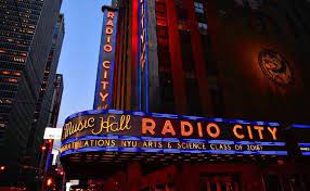 Top 10 Iconic American Signs Travel Trivia Travel Facts Chicago Signs Radio City Music Hall