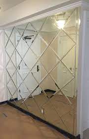 The orange mirror picks up on the warmth of the. Custom Beveled Diamond Shape Mirror Wall By Century Glass 2007 Hwy 90 A Missouri City Tx Mirror Wall Bedroom Mirror Wall Decor Mirror Design Wall