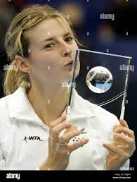 Martina Sucha, of Slovakia, kisses her trophy after winning over Abigail  Spears, of San Diego, Calif., in the final of the Bell Challenge WTA  tournament in Quebec City, Sunday Nov. 7, 2004.