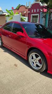 Image result for Inferno Red 2007 Stratus